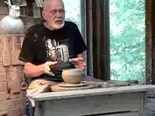 Warren MacKenzie paddling a bowl