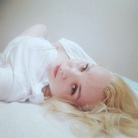 Оля Попова