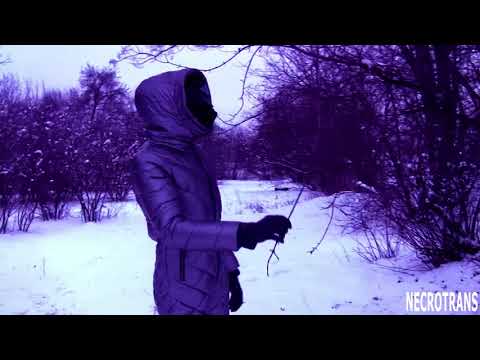 Winter overalls in steel silver color, black and mirrored gas masks. Winter walks in a