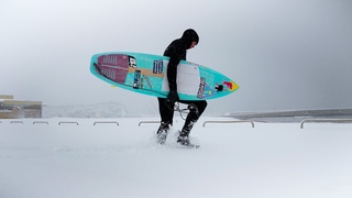 SURFING IN A FREEZING SNOWSTORM!